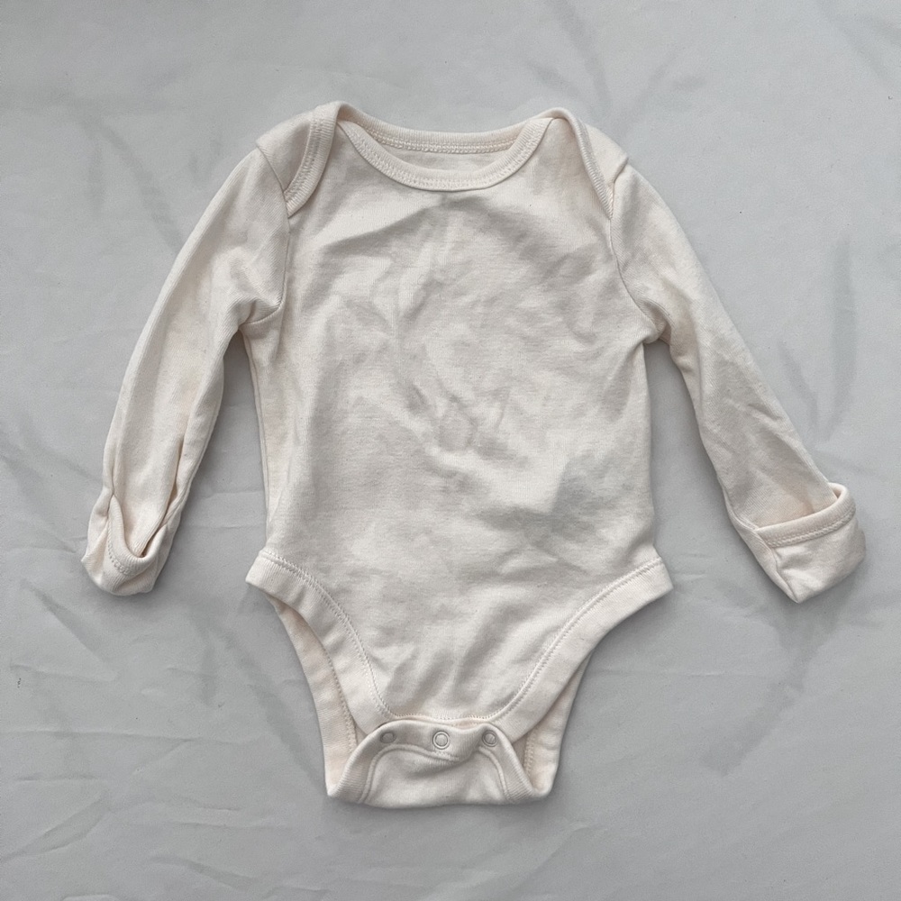 Cream old navy NB onesie slightly worn